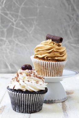 Coffee and chocolate cupcakes. clipart