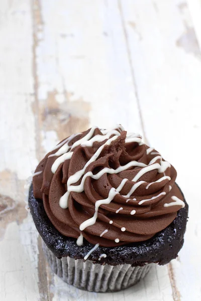 Creamy chocolate cupcake — Stock Photo, Image