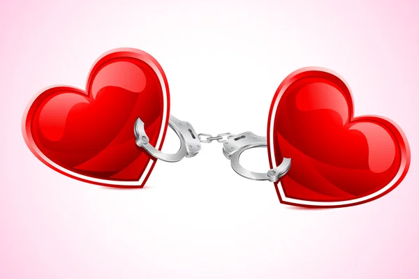 Сердца связаны наручниками — стоковый вектор