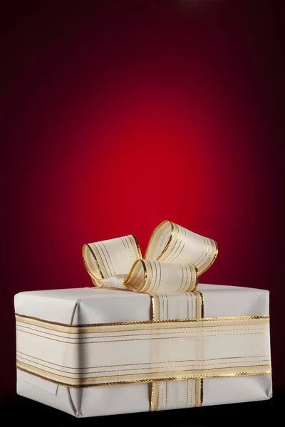 White gift box with bow ribbon — Stock Photo, Image