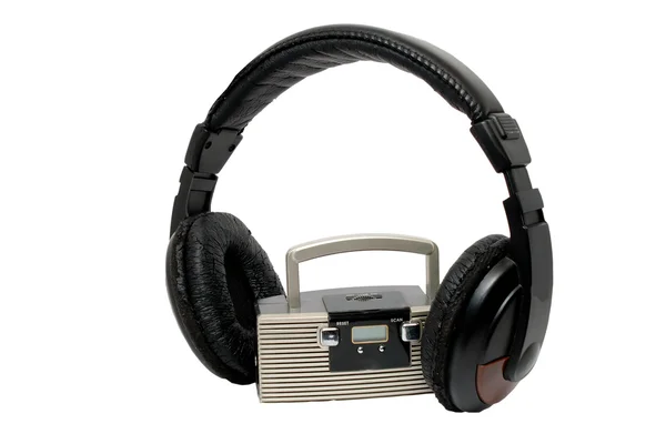 stock image Little radio and big headphones