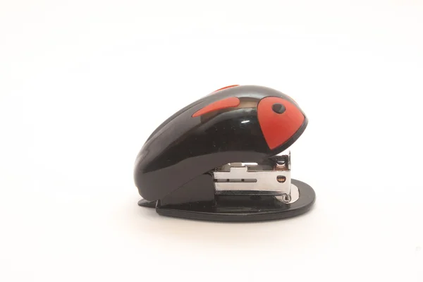 Маленький степлер черный с красным — стоковое фото