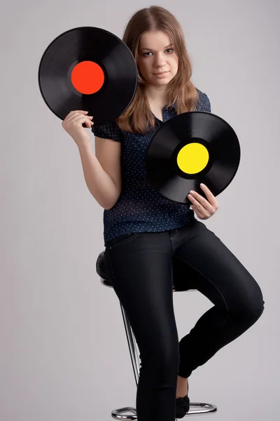 Girl with two music plate — Stock Photo, Image