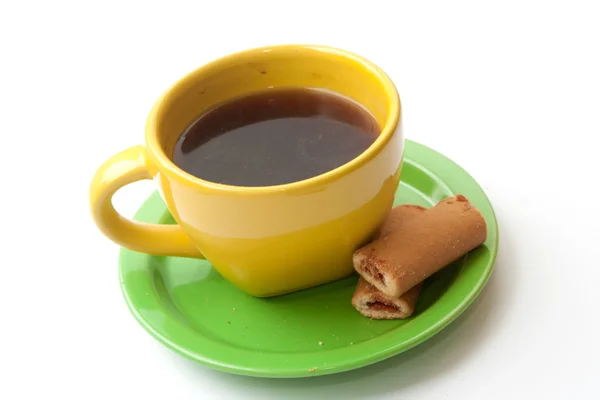 Gelbe Tasse Kaffee mit Keksen — Stockfoto