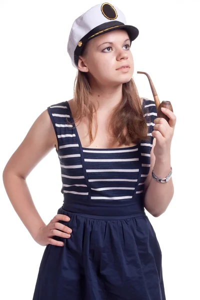 Girl in a sailor cap smoking a pipe — Stock Photo, Image