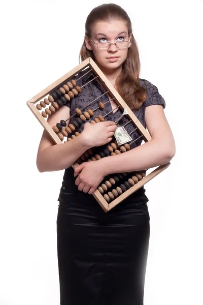 Girl with big wooden accounts and money — Stock Photo, Image