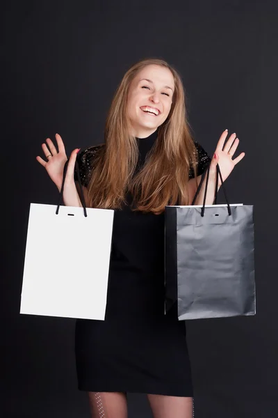 Menina feliz com compras — Fotografia de Stock