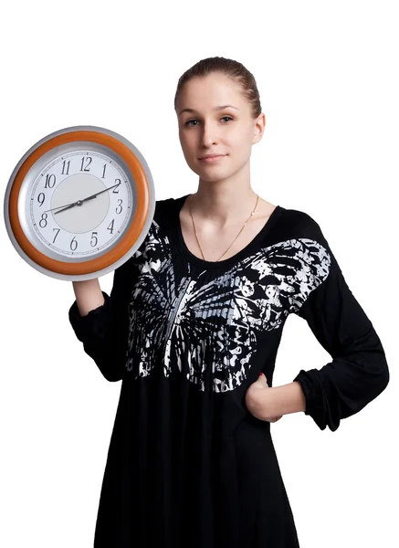 The girl with the big clock in the hands — Stock Photo, Image