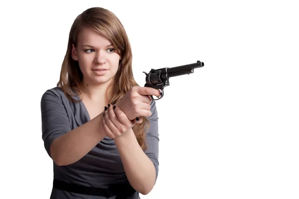 Lány egy pisztollyal a kezében — Stock Fotó