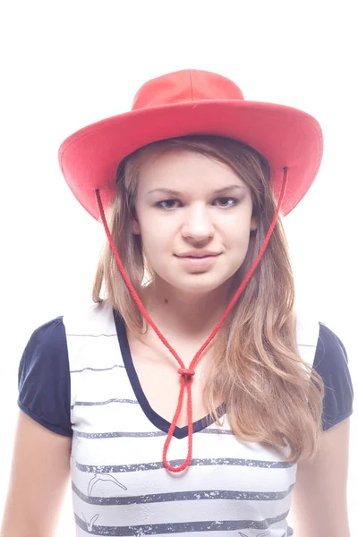 一个女孩在一顶红色帽子的肖像 — 图库照片