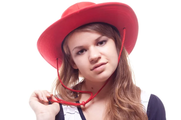 लाल टोपीत एका मुलीचे पोर्ट्रेट — स्टॉक फोटो, इमेज