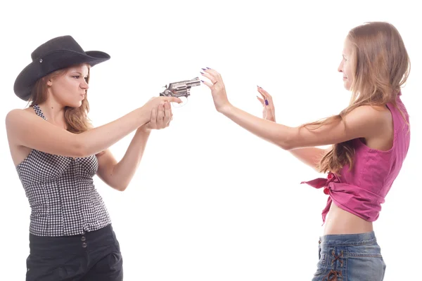 Portret van twee jonge meisjes met een pistool — Stockfoto