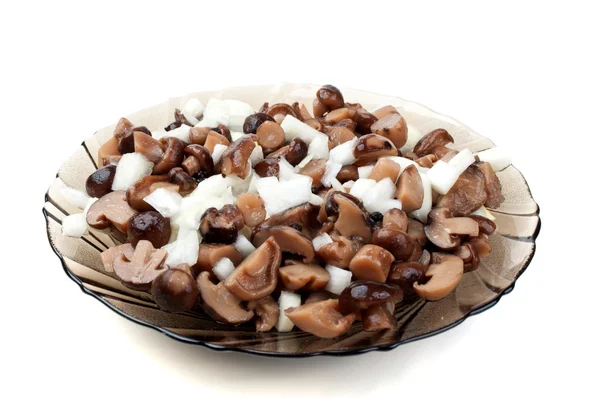 Pickled mushrooms on a plate Stock Picture