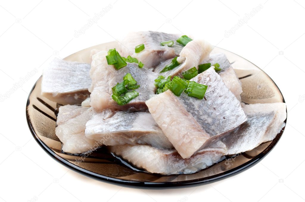 Pieces of herring on a plate