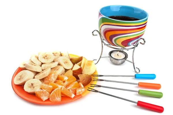 Fondue cup and plate with fruits — Stock Photo, Image