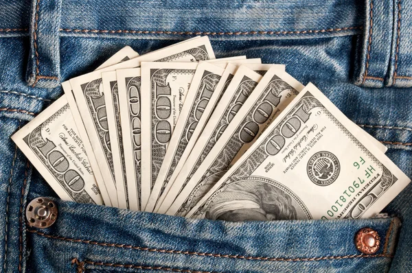 Notas de dólar americano no bolso jeans — Fotografia de Stock