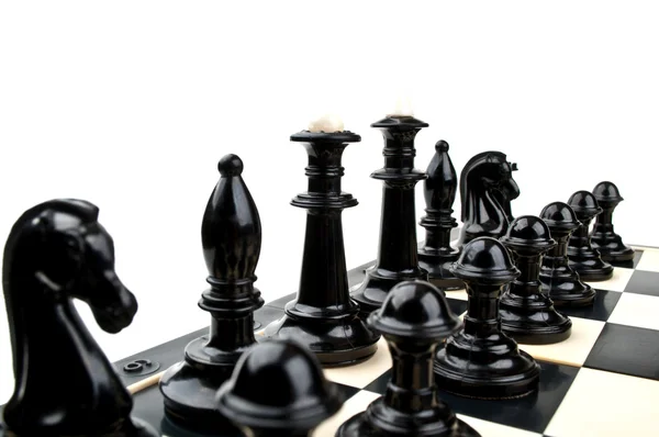 Svarta schack i styrelsen — Stockfoto