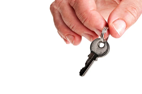 Silver keys in a hand — Stock Photo, Image