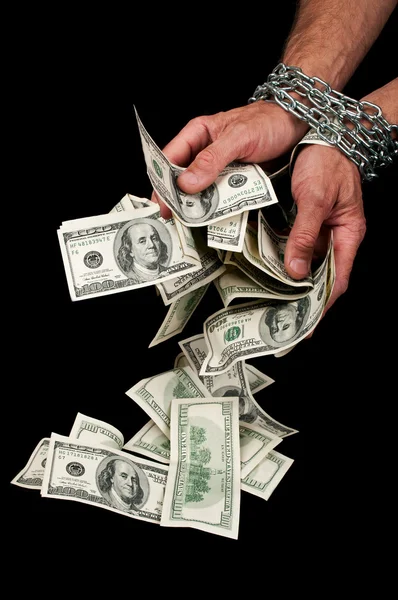 Ruce s dolary v řetězci — Stock fotografie