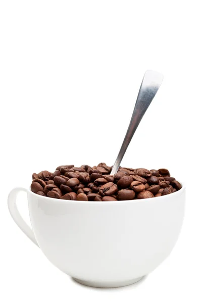 Чашка повна кавових зерен — стокове фото