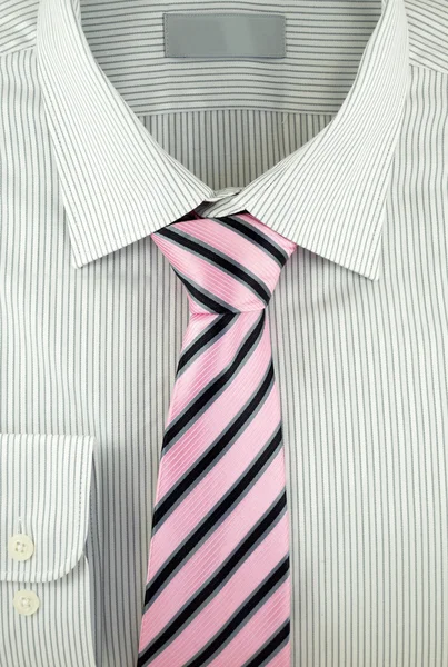New shirt with striped silk necktie — Stock Photo, Image