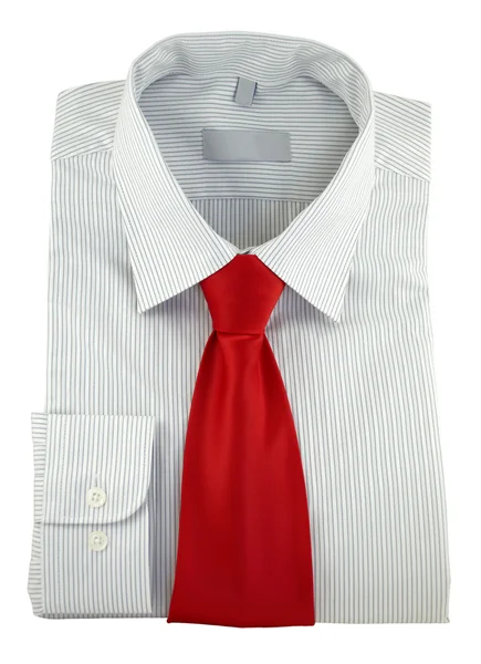 Nowe pasiastą koszulę z czerwone krawat na białym tle nad białym — Zdjęcie stockowe