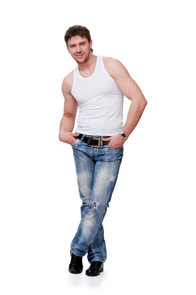 Mannen i jeans är på en isolerad bakgrund — Stockfoto