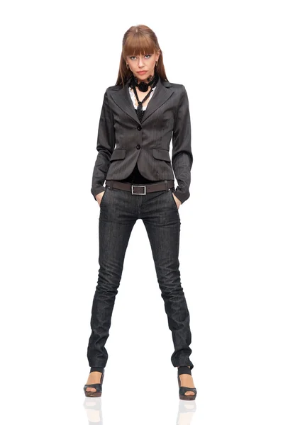Mulher de jeans e casaco — Fotografia de Stock