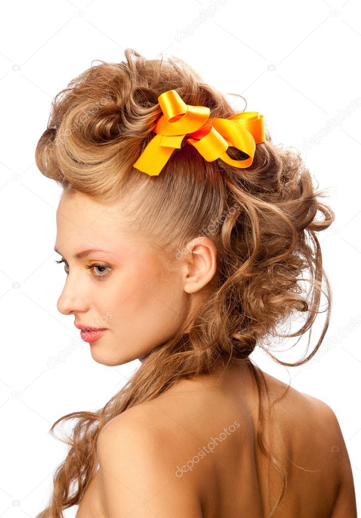 Beautiful girl with an elegant hairstyle