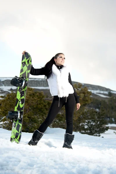 Flicka med snowboard — Stockfoto