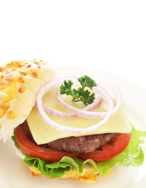 Ízletes hamburger patty marhahús és a paradicsom — Stock Fotó