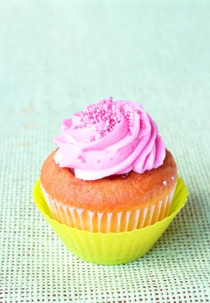 Freshly baked strawberry and vanilla cupcake — Stock Photo, Image