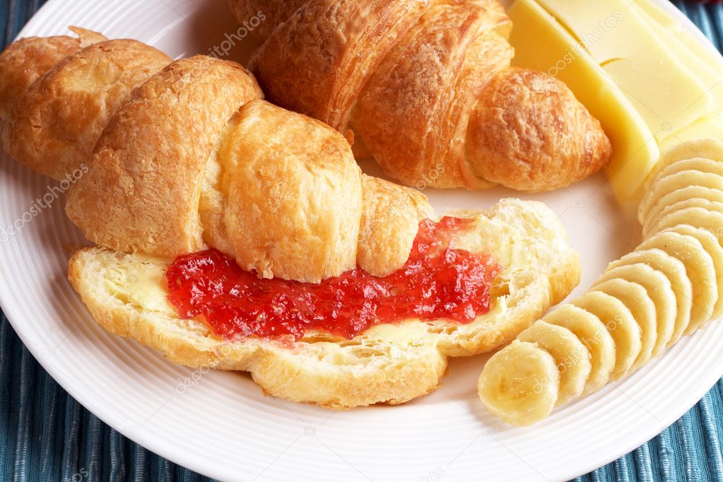 Croissant with cheese, jam and bananas