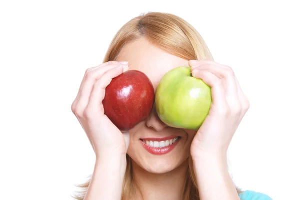Flickan och två äpplen — Stockfoto
