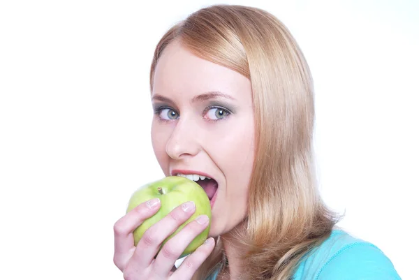 The girl o bites an apple — Stock Photo, Image