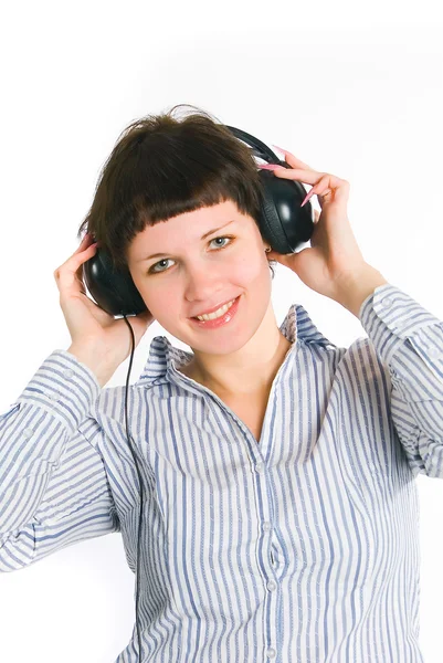 The girl listens to music — Stock Photo, Image