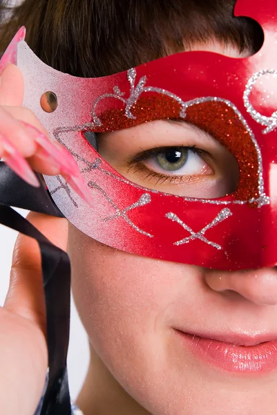 Stock image The girl in carnival to a mask