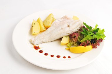 Steam pike perch with a garnish clipart