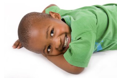 Adorable 3 year old black or African American boy with a smile