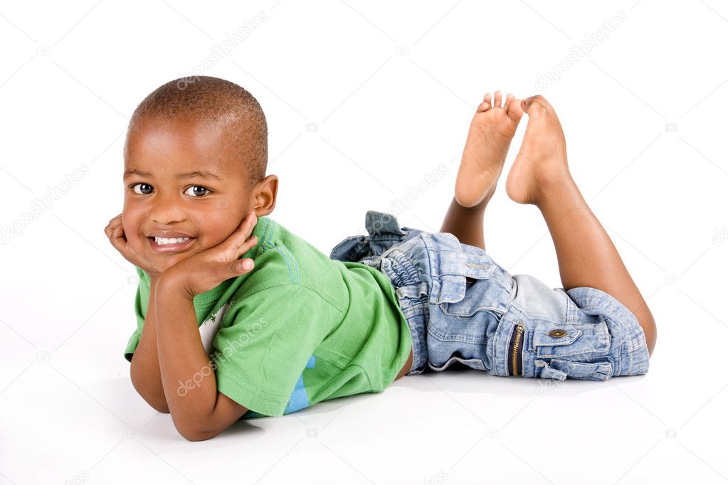Adorable 3 year old black or African American boy with a big smile