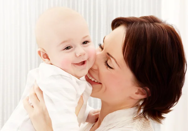 Happy mother with a baby — Stock Photo, Image