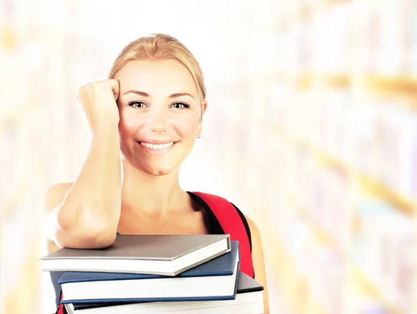 Smiling student girl portrait with books — Stock Photo, Image