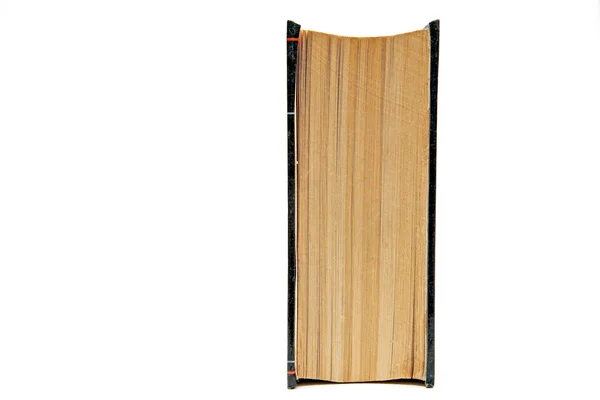 Buch vertikal auf weißem Hintergrund platziert — Stockfoto
