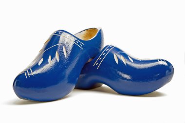 Traditional dutch wooden shoes made of wood clipart