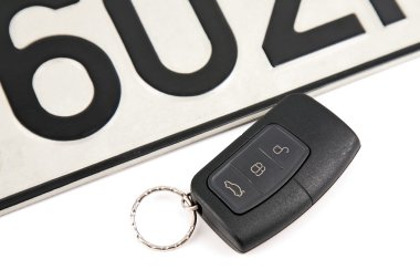 Remote controlled car key and registration plate clipart