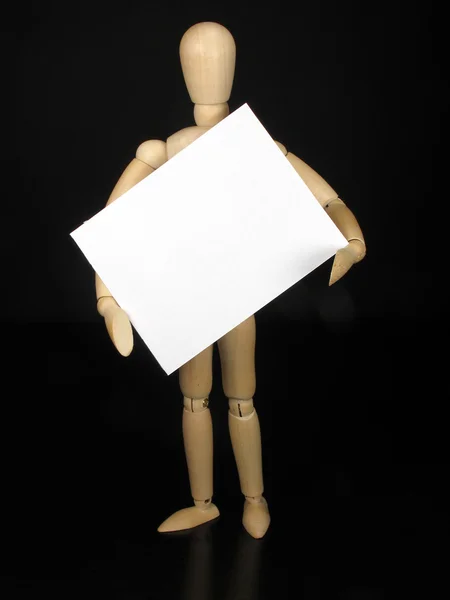 Humanoid doll with black background and white sign to write thin — Stock Photo, Image