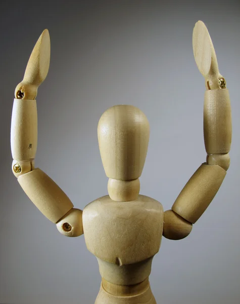 Humanoid posing with arms raised — Stock Photo, Image
