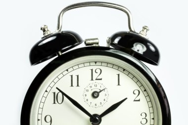 Front view of an antique clock on a white background black clipart