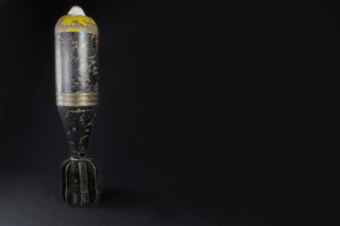 Mortar bomb black and yellow very old and rusty clipart