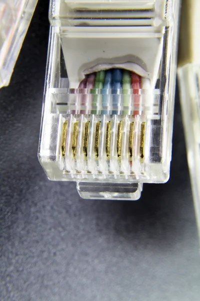 Makro několik síťový konektor rj45 na černém pozadí — Stock fotografie